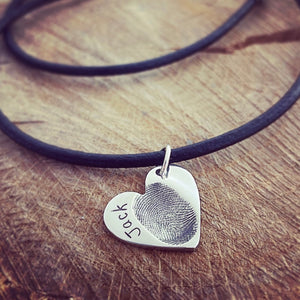 fingerprint heart pendant on leather necklace