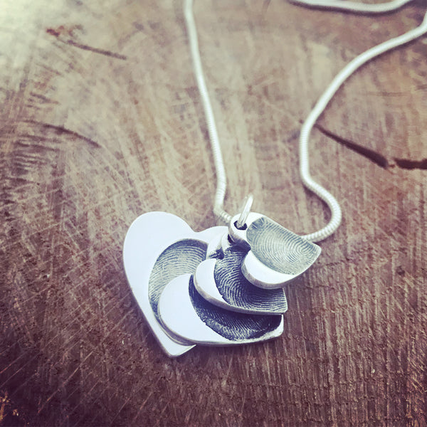 cascading heart pendants on a snake chain