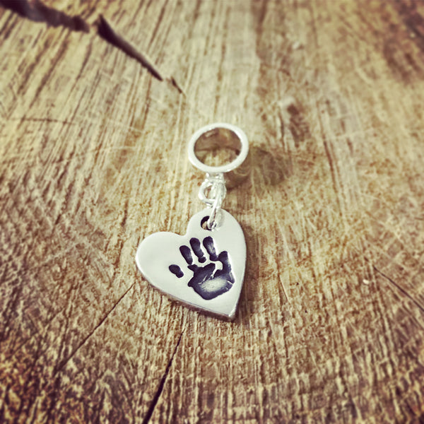 handprint charm on pandora bail