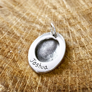 fingerprint oval pendant