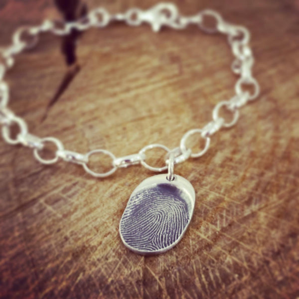 fingerprint oval charm belcher bracelet