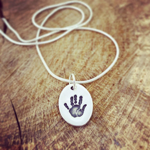 handprint oval pendant snake chain